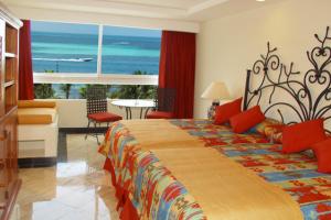 pokój Oasis Grand Caribbean Resort